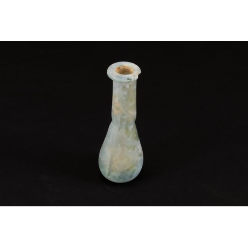 318 - An Ancient Roman Glass Unguentarium Blown from Pale Translucent Glass with a Slight Teal Tint Circa ... 