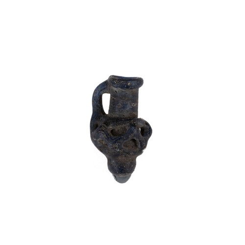 320 - An Ancient Roman Dark Blue Glass Miniature Juglet Pendant Circa 1st-3rd Century A.D.

Approximately ... 