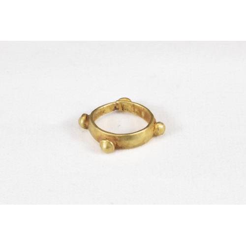 323 - An Ancient Roman Gold Ring with Granules Circa 1st-3rd Century A.D.

Internal D: Approximately 1.3cm... 