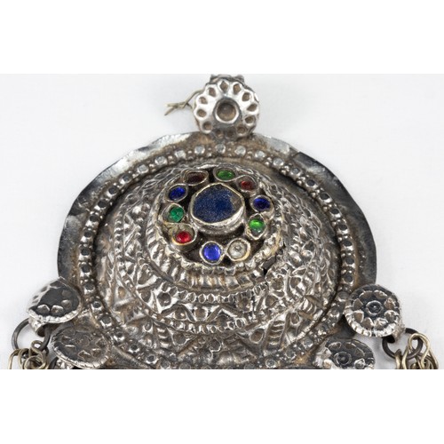 66 - **NO RESERVE**

A Tribal Afghan White Metal Pendant Decorated with Fitted Glass.

H: Approximately 1... 