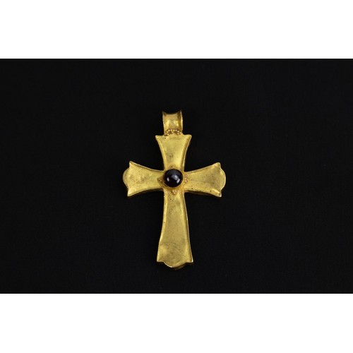 281 - A Late Byzantine Gold Cross Pendant Decorated with Garnets from the 16th Century.

Approximately 5x3... 