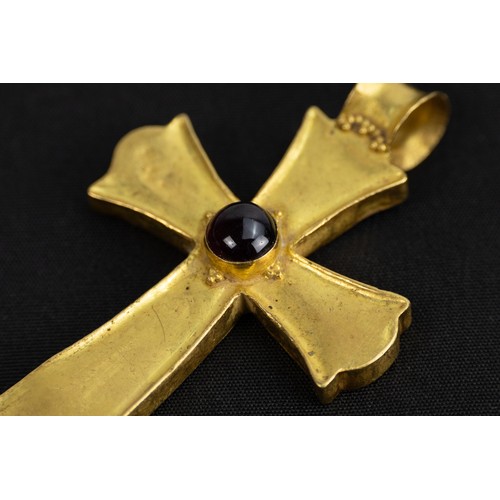 281 - A Late Byzantine Gold Cross Pendant Decorated with Garnets from the 16th Century.

Approximately 5x3... 