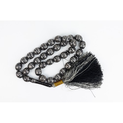 159 - An Islamic Black Prayer Beads Tasbih with White Metal Inlay.