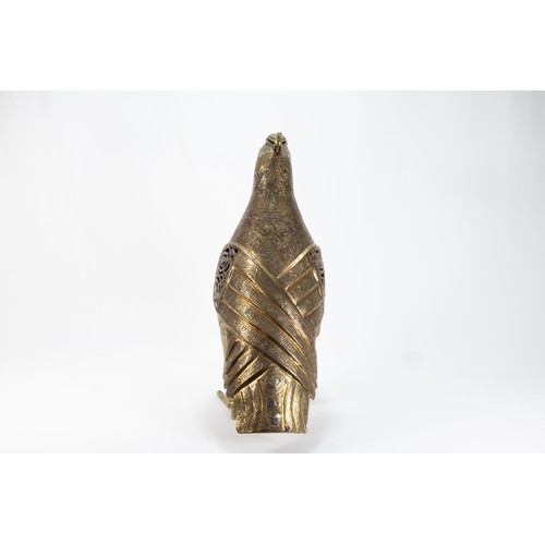 165 - An Islamic Bronze Figure of a Bird Decorated with Kufic Inspirations and Floral Patterns in Silver I... 