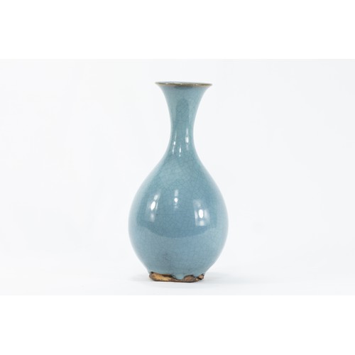 78 - A Chinese Baby Blue Crackled Porcelain Vase.

H: Approximately 24.5cm