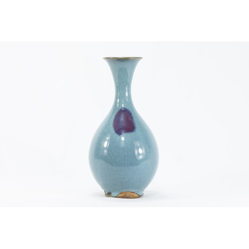 78 - A Chinese Baby Blue Crackled Porcelain Vase.

H: Approximately 24.5cm