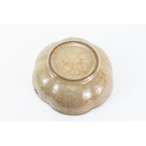 79 - A Chinese Beige Crackled Porcelain Bowl.

D: Approximately 20cm