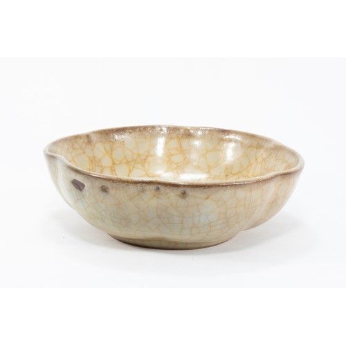 79 - A Chinese Beige Crackled Porcelain Bowl.

D: Approximately 20cm