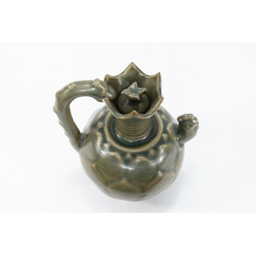 80 - A Chinese Green Celadon Jug with Lid

H: Approximately 15cm