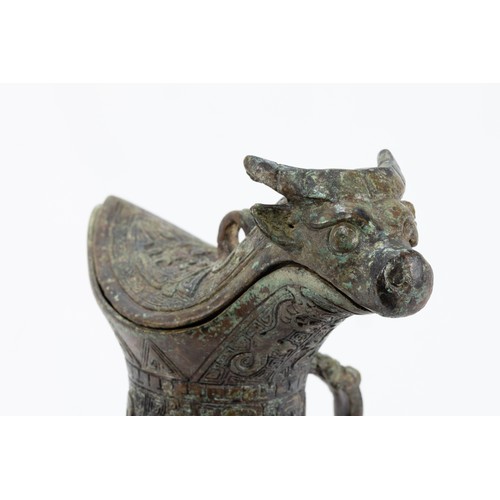 82 - A Chinese Bronze Oil Lamp in the Shape of a Cow.

H: Approximately 20cm