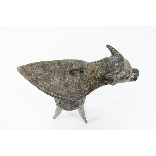 82 - A Chinese Bronze Oil Lamp in the Shape of a Cow.

H: Approximately 20cm