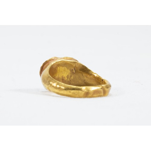 23 - A Roman Gold Ring with a Garnet Stone from 625 BC- 476 AD.

Approximately 3g

Private Collection fro... 