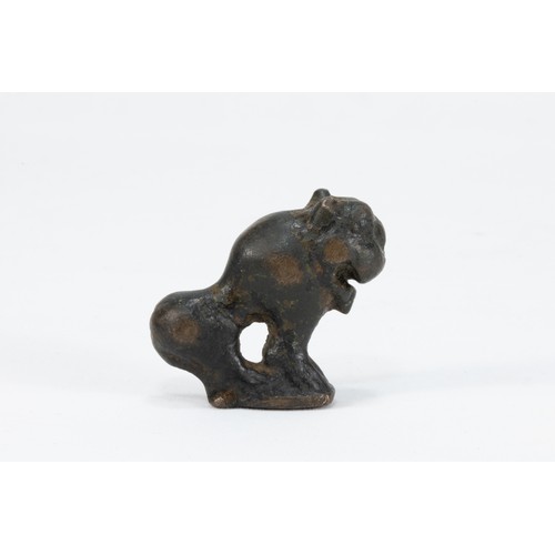 166 - An Islamic Bronze Figure of a Lion from the 12th Century.

L: Approximately 4.7cm