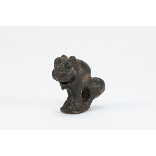 166 - An Islamic Bronze Figure of a Lion from the 12th Century.

L: Approximately 4.7cm