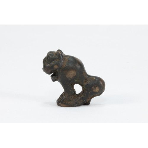 166 - An Islamic Bronze Figure of a Lion from the 12th Century.

L: Approximately 4.7cm