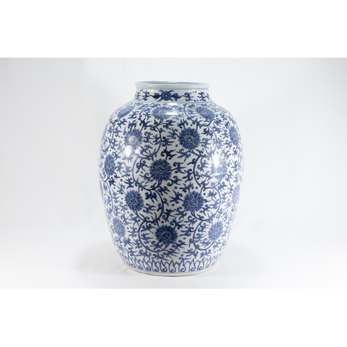 85 - A Large Chinese Blue & White Porcelain Vase Decorated with Floral Patterns.

H: Approximately 42cm