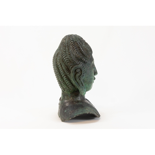 87 - A Chinese Tibetan Bronze Buddha Head with Green Patina.

H: Approximately 25cm