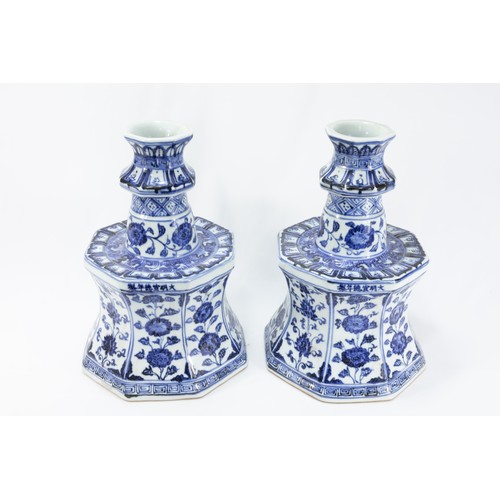 91 - A Pair of Chinese Blue & White Porcelain Candlesticks Decorated with Floral Patterns.

H: Approximat... 