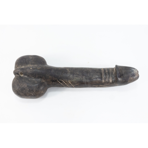 92 - A Chinese Tibetan Carved Stone Phallus.

L: Approximately 29cm