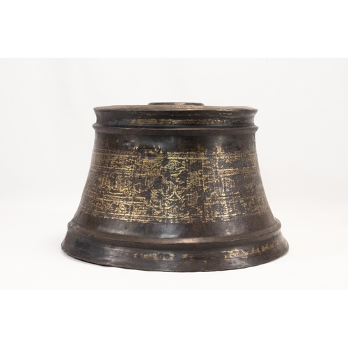 192 - An Islamic Mamluk Bronze Candlestick from the 14th Century Decorated with Engravings.

H: Approximat... 