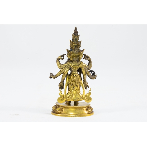 40 - A Rare Tibetan Bronze Gold Gilt Figure of Avalokiteshvara.

H without stand: Approximately 10.2cm

P... 