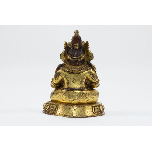 47 - A Tibetan Bronze Gold Gilt Figure of Jambhala from Kagyu Lineage Decorated with Turquoise Stones fro... 