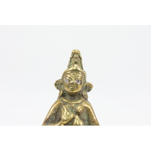 49 - A Tibetan Bronze Figure of Mahassidha Decorated with Silver Eyes from the 18th-19th Century.

H: App... 