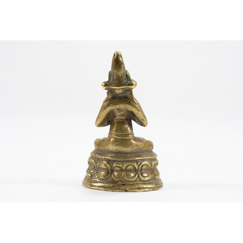 49 - A Tibetan Bronze Figure of Mahassidha Decorated with Silver Eyes from the 18th-19th Century.

H: App... 