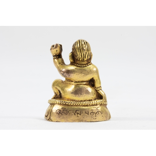 51 - A Tibetan Bronze Gold Gilt Figure of Mahasiddhu or a Spiritual Master from the Early 19th Century.

... 