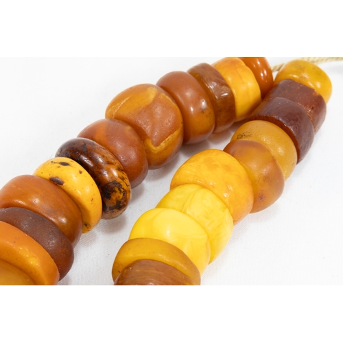 323 - A Tribal Moroccan Amber Beads Necklace.

Half breaded length: Approximately 13.5cm

55.3g