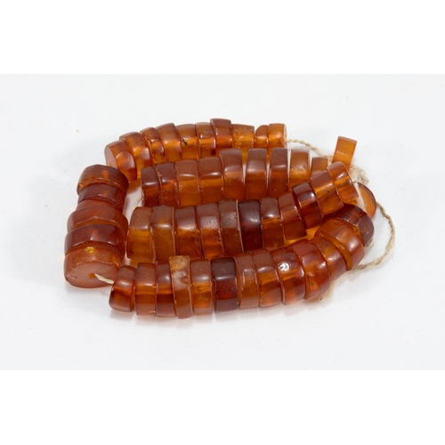 56 - A Single Strand Tibetan Amber Beads Necklace. 

Half-breaded length: 23cm

63g