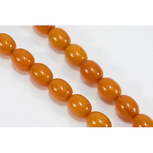 194 - An Islamic Single Strand Butterscotch Amber Prayer Beads Tasbih.

Half breaded length: Approximately... 