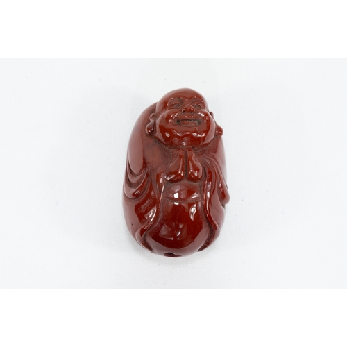 111 - A Chinese Red Agate Lucky Buddha Pendant.

H: Approximately 4.8cm