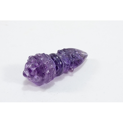 57 - A Tibetan Amethyst Crystal Vajra Dorje.

L: Approximately 6cm