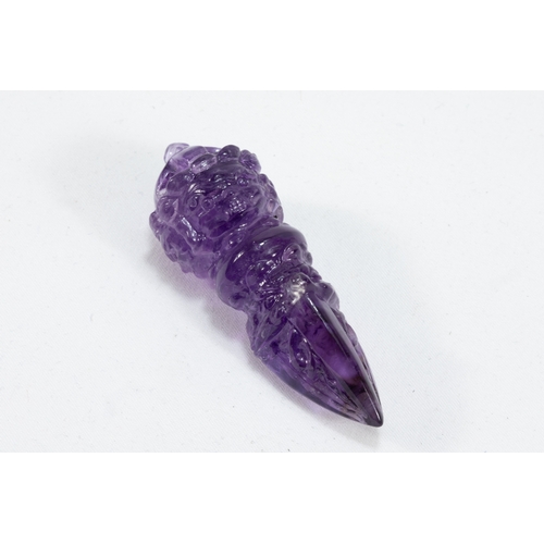 57 - A Tibetan Amethyst Crystal Vajra Dorje.

L: Approximately 6cm