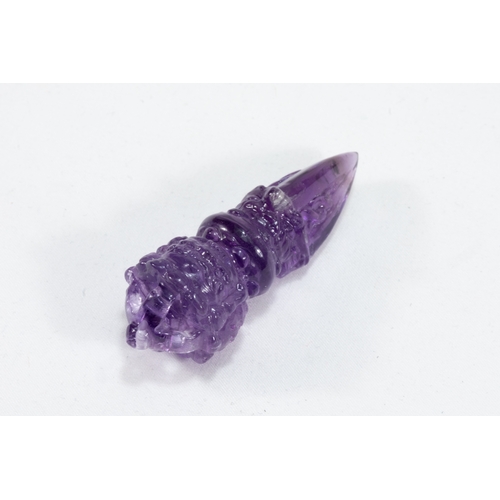 57 - A Tibetan Amethyst Crystal Vajra Dorje.

L: Approximately 6cm