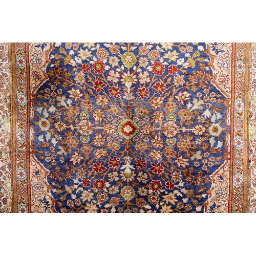 74 - A Turkish Silk Hereke Rug

Warp: Silk
Weft: Silk
Pile: Silk

Approximately 143cm x 95cm