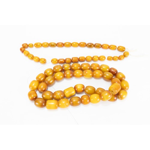 327 - A Lot of 2 Tribal Yemeni Amber Coloured Beads Necklaces.

400g