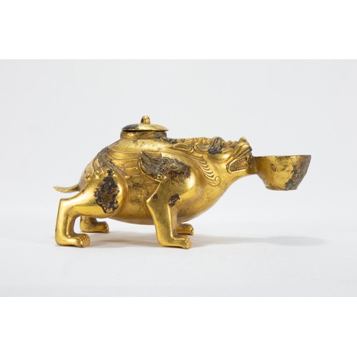 113 - A Chinese Bronze Gilted Oil Lamp in the Form of a Dog with a Bowl in his Mouth.

L: Approximately 16... 