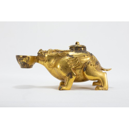 113 - A Chinese Bronze Gilted Oil Lamp in the Form of a Dog with a Bowl in his Mouth.

L: Approximately 16... 