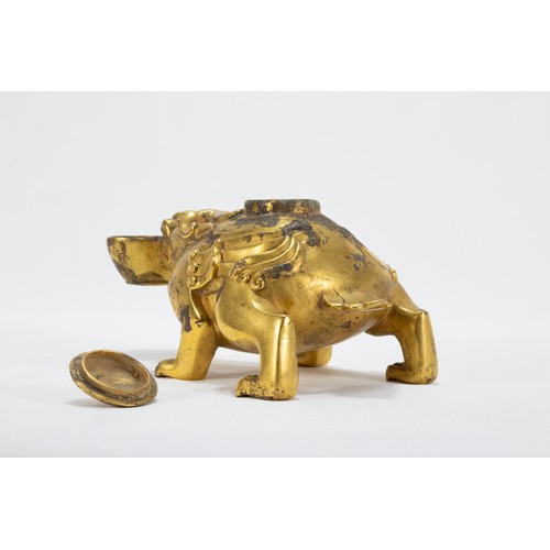 113 - A Chinese Bronze Gilted Oil Lamp in the Form of a Dog with a Bowl in his Mouth.

L: Approximately 16... 