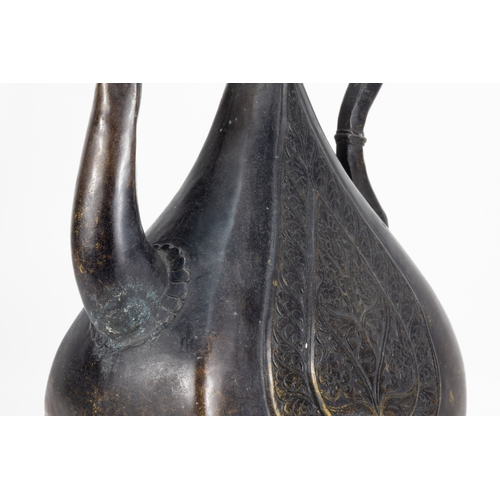 202 - An Islamic Indian Mughal Bronze Ewer Decorated with Floral Patterned Carvings & Sprout in the Form o... 