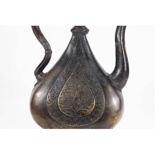 202 - An Islamic Indian Mughal Bronze Ewer Decorated with Floral Patterned Carvings & Sprout in the Form o... 