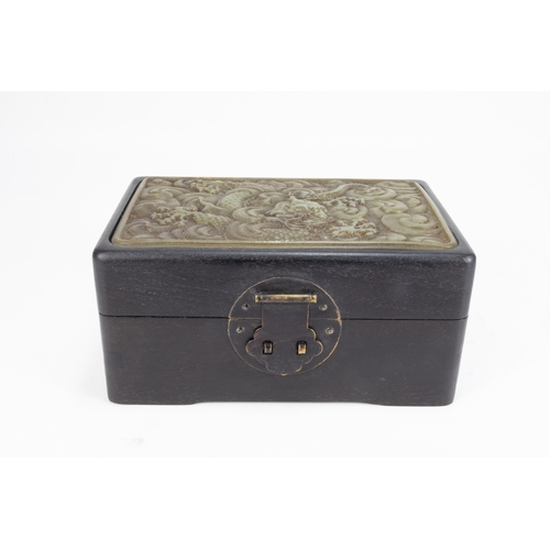 119 - A Large Chinese Hardwood Jade Jewellery Box Depicting a Dragon. 

Approximately 13.6cm x 8cm x 10.5c... 