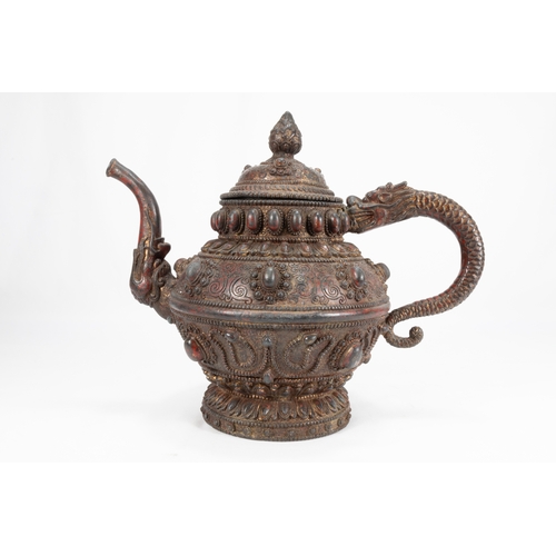 60 - A Large Tibetan Bronze Teapot with the Handle & Sprout Shaped as a Dragon 

H: Approximately 25cm