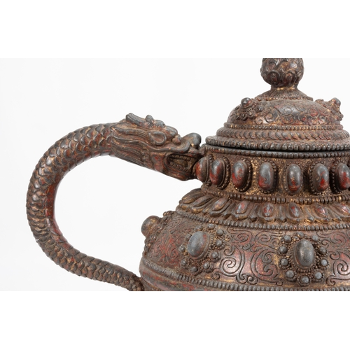 60 - A Large Tibetan Bronze Teapot with the Handle & Sprout Shaped as a Dragon 

H: Approximately 25cm