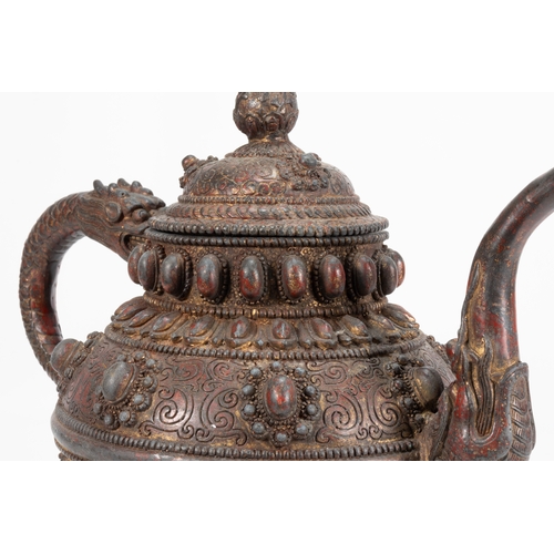 60 - A Large Tibetan Bronze Teapot with the Handle & Sprout Shaped as a Dragon 

H: Approximately 25cm