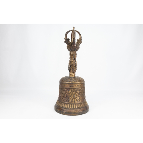 62 - A Large Tibetan Buddhist Bronze Gilt Bell Decorated with Vajras & a Buddha Deity.

H: Approximately ... 