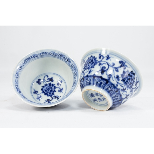 122 - A Pair of Chinese Blue & White Porcelain Bowls Decorated with Floral Patterns & 6 Character Marks to... 