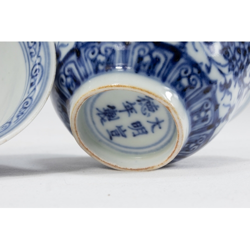 122 - A Pair of Chinese Blue & White Porcelain Bowls Decorated with Floral Patterns & 6 Character Marks to... 